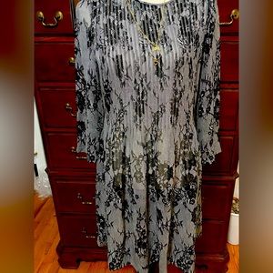 Club Monaco little black dress. This sheer dress is perfect for any occasion.